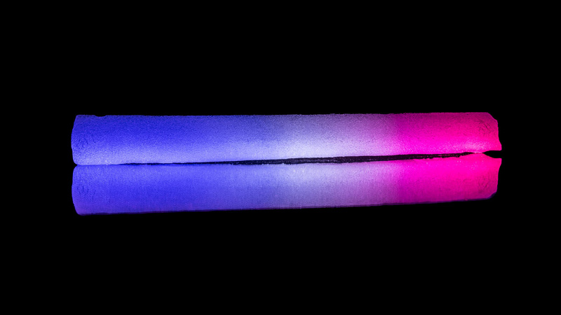core from Greenland’s ice sheet, lit to mimic France’s tricolour flag